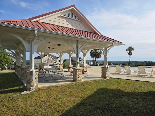 view of home's community featuring a gazebo, a yard, and a patio