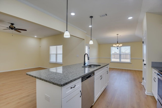 kitchen with sink, dishwasher, white cabinetry, an island with sink, and decorative light fixtures