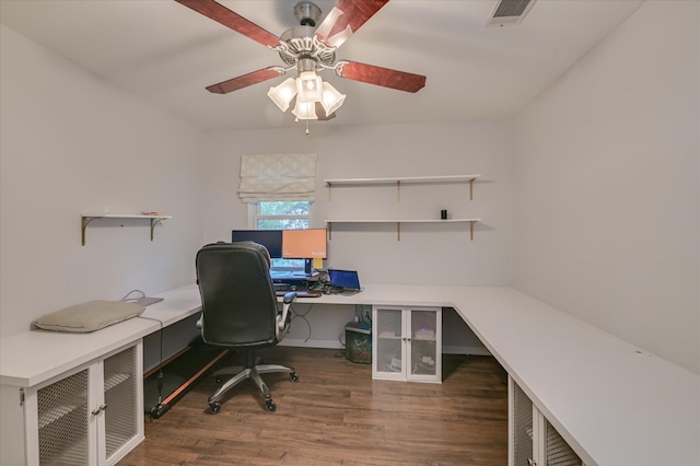 home office with wood finished floors and a ceiling fan