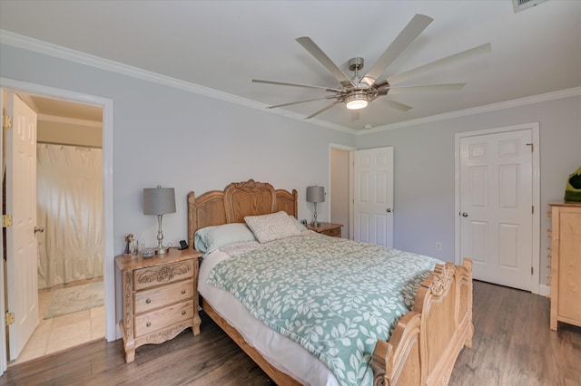 bedroom featuring wood finished floors, ornamental molding, and ceiling fan