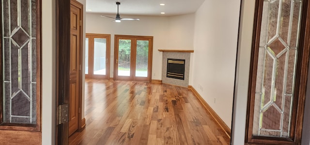 204 Alston Pl, Mccormick, SC 29835 - unfurnished living room with light wood-style flooring, ceiling fan, baseboards, a fireplace, and recessed lighting