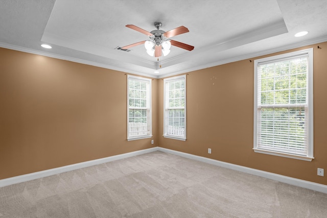 2532 Grier Cir, Evans, GA 30809 - spare room with a tray ceiling, crown molding, recessed lighting, ceiling fan, and baseboards