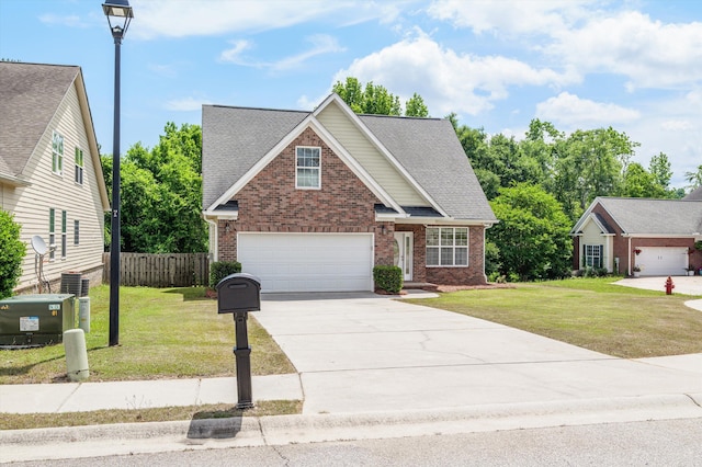2532 Grier Cir, Evans, GA 30809 - view of front of home with brick siding, concrete driveway, a garage, and a shingled roof