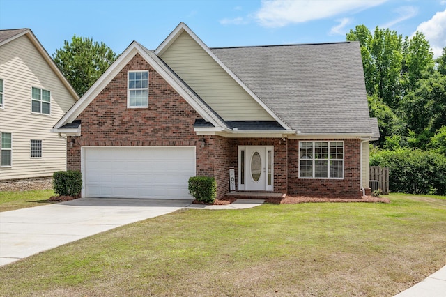 2532 Grier Cir, Evans, GA 30809 - view of front of house with brick siding, concrete driveway, an attached garage, and roof with shingles