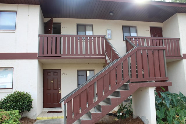 doorway to property featuring a balcony