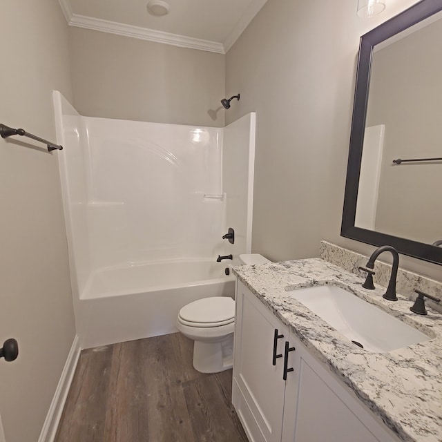 556 Hillman St, Warrenville, SC 29851 - full bath featuring wood finished floors, crown molding, toilet,  shower combination, and vanity
