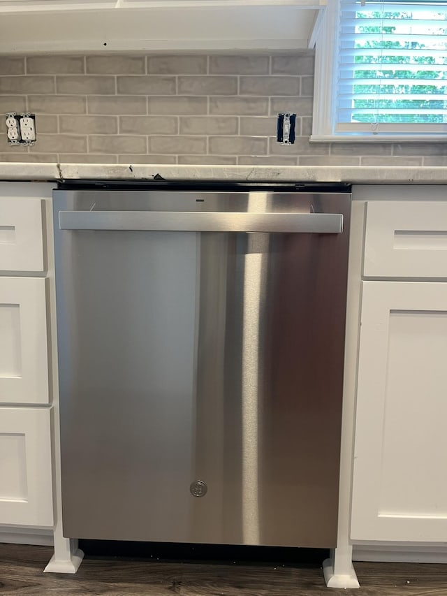 3517 Jamaica Dr, Augusta, GA 30909 - kitchen view of dishwasher, tasteful backsplash, and dark wood finished floors