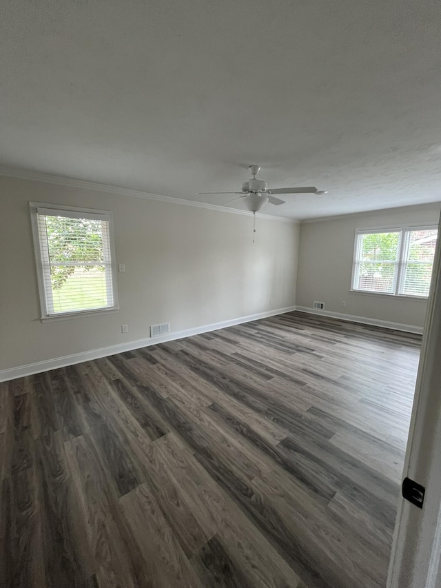3517 Jamaica Dr, Augusta, GA 30909 - unfurnished room featuring crown molding, dark wood-style floors, and ceiling fan