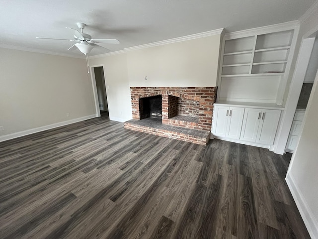 3517 Jamaica Dr, Augusta, GA 30909 - unfurnished living room with dark wood-type flooring, a ceiling fan, a brick fireplace, and ornamental molding
