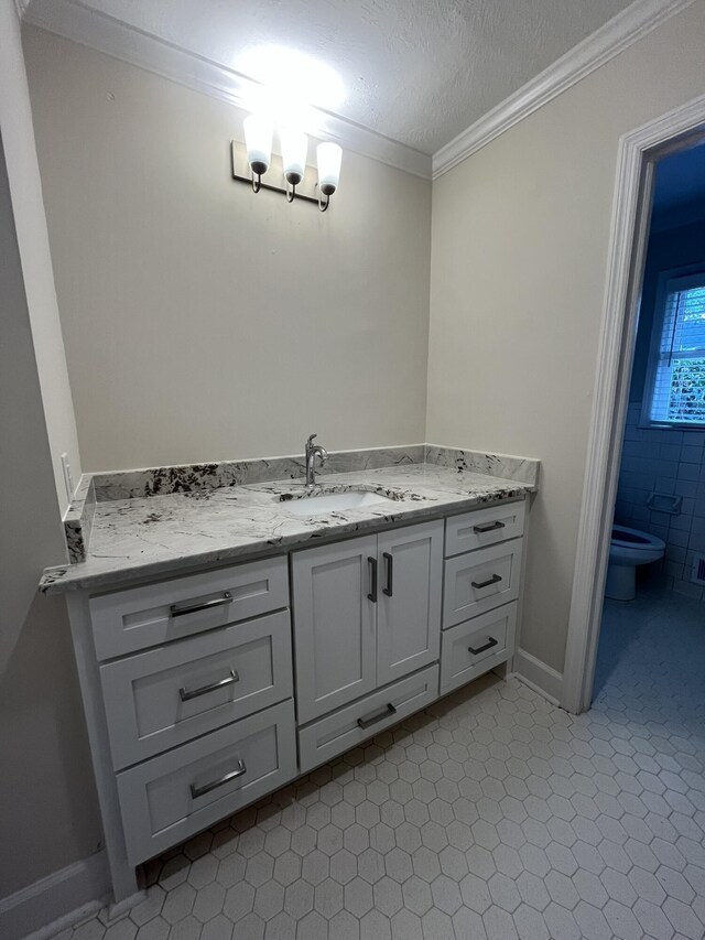 3517 Jamaica Dr, Augusta, GA 30909 - bathroom featuring vanity, crown molding, and a textured ceiling