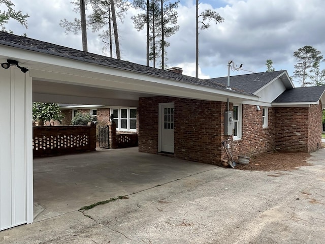3517 Jamaica Dr, Augusta, GA 30909 - view of side of home featuring brick siding and roof with shingles