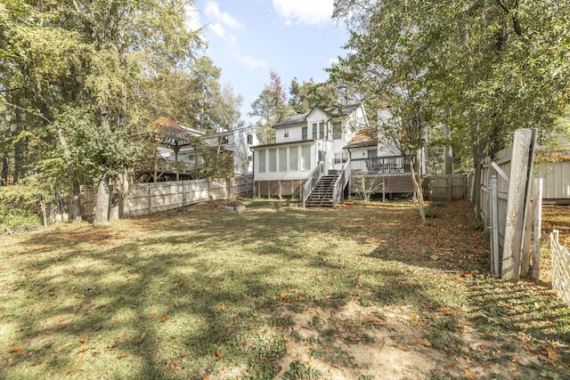 view of yard featuring a wooden deck