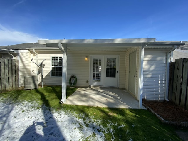 back of property with a patio area