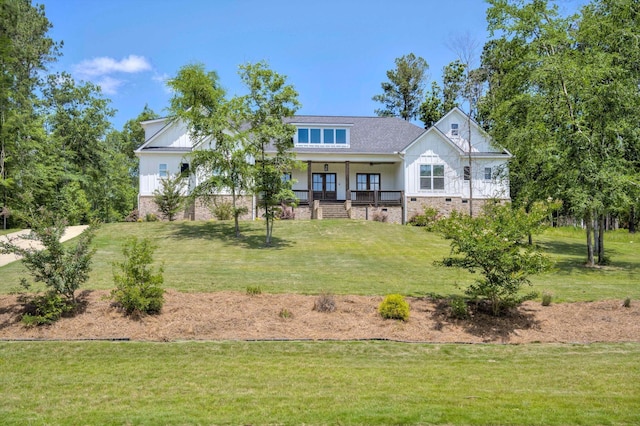 110 Collin Reeds Rd, North Augusta, SC 29860 - view of front of home featuring board and batten siding, a porch, a front lawn, and brick siding