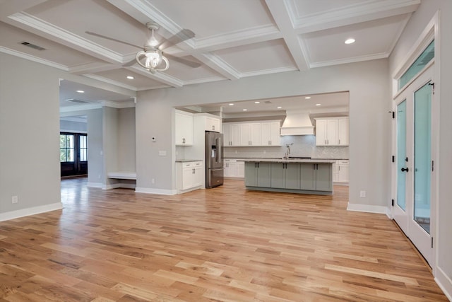 110 Collin Reeds Rd, North Augusta, SC 29860 - unfurnished living room featuring a ceiling fan, light wood finished floors, a sink, coffered ceiling, and beam ceiling