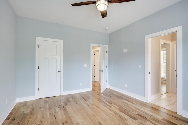 110 Collin Reeds Rd, North Augusta, SC 29860 - unfurnished bedroom featuring light wood-style floors, baseboards, ceiling fan, and a closet
