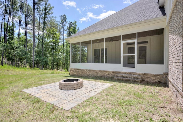 110 Collin Reeds Rd, North Augusta, SC 29860 - view of green lawn featuring an outdoor fire pit, a sunroom, and a patio area