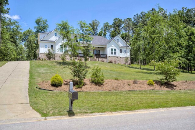 110 Collin Reeds Rd, North Augusta, SC 29860 - view of front of home with board and batten siding and a front yard