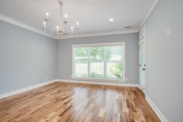 110 Collin Reeds Rd, North Augusta, SC 29860 - empty room featuring ornamental molding, a chandelier, light wood-style floors, and baseboards