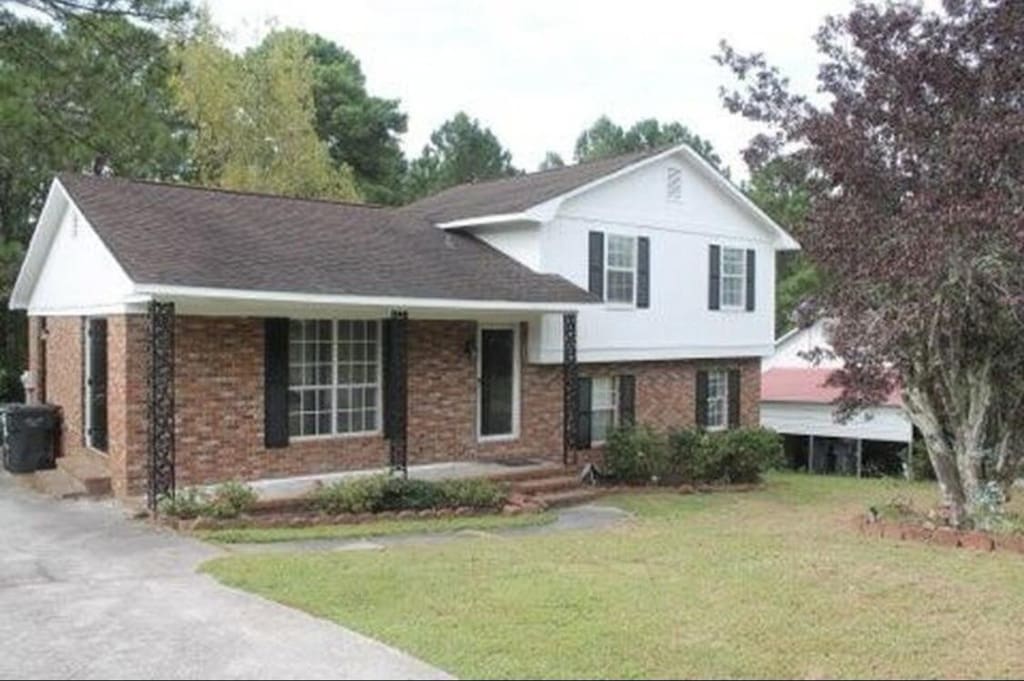 2660 Barclay Rd, Hephzibah, GA 30815 - split level home with brick siding and a front yard