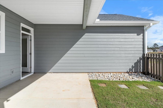 garage with a patio