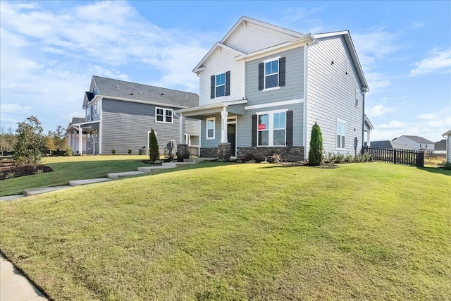 view of front facade featuring a front yard