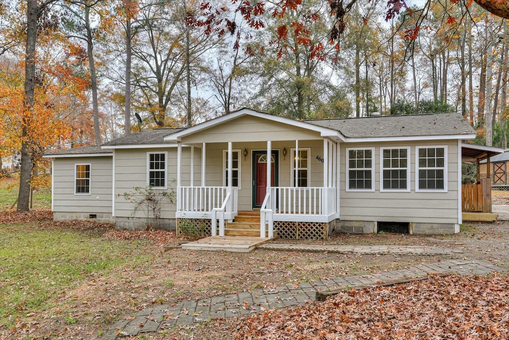 ranch-style house featuring a porch