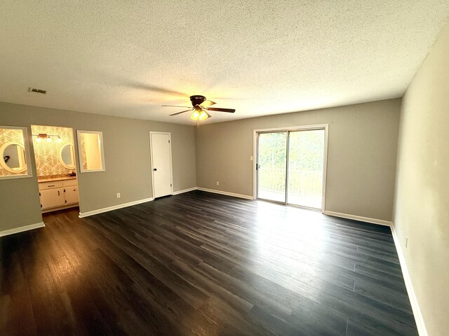 231 Norma Ln, Evans, GA 30809 - unfurnished room featuring ceiling fan, baseboards, a textured ceiling, and dark wood-style floors