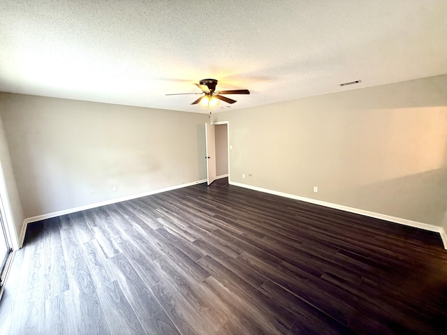 231 Norma Ln, Evans, GA 30809 - spare room with ceiling fan, dark wood finished floors, baseboards, and a textured ceiling