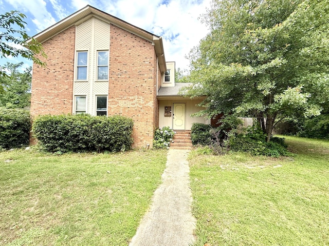 231 Norma Ln, Evans, GA 30809 - view of front of house featuring a front lawn and brick siding