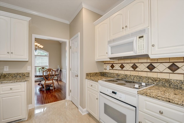 322 Farmington Dr, Evans, GA 30809 - kitchen featuring white appliances, crown molding, a chandelier, backsplash, and white cabinetry