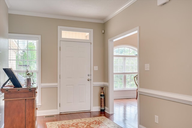 322 Farmington Dr, Evans, GA 30809 - foyer entrance with wood finished floors, crown molding, and baseboards