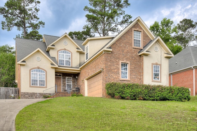 322 Farmington Dr, Evans, GA 30809 - traditional-style house featuring stucco siding, a garage, brick siding, driveway, and a shingled roof