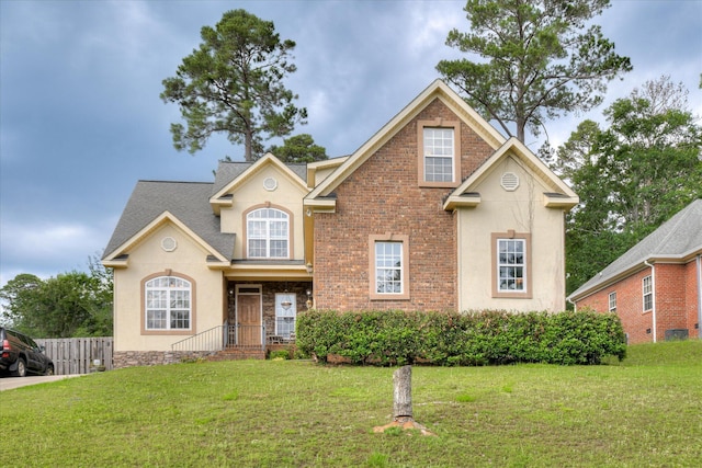 322 Farmington Dr, Evans, GA 30809 - traditional-style home featuring stucco siding and a shingled roof