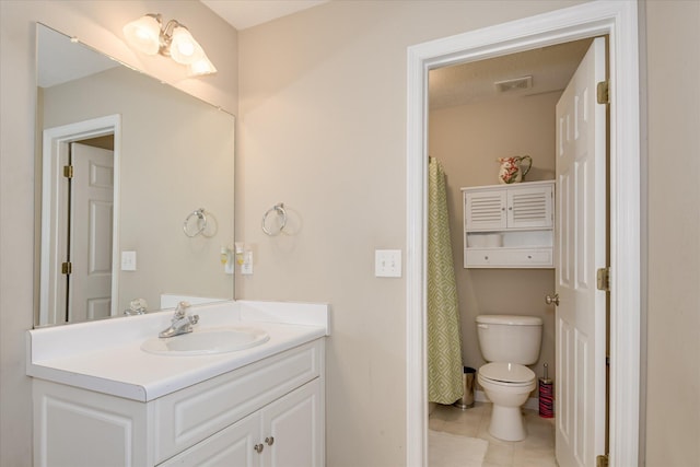 322 Farmington Dr, Evans, GA 30809 - full bath with toilet, tile patterned floors, and vanity