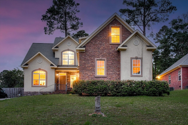 322 Farmington Dr, Evans, GA 30809 - traditional-style home with stucco siding and roof with shingles