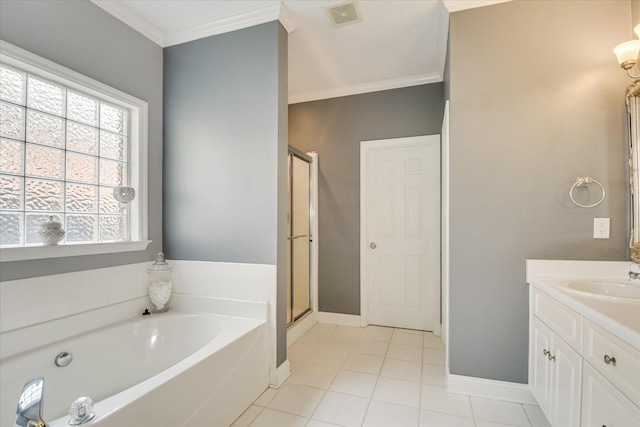 322 Farmington Dr, Evans, GA 30809 - full bathroom with tile patterned flooring, crown molding, a garden tub, a stall shower, and baseboards