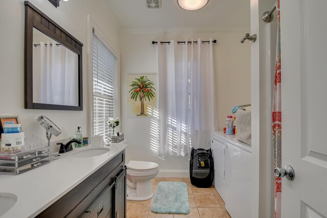 1321 Holden St, Augusta, GA 30904 - full bathroom featuring washer and clothes dryer, double vanity, tile patterned flooring, and crown molding