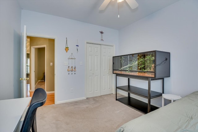5407 Kiokee Ridge Rd, Evans, GA 30809 - carpeted bedroom with a closet, a ceiling fan, and baseboards