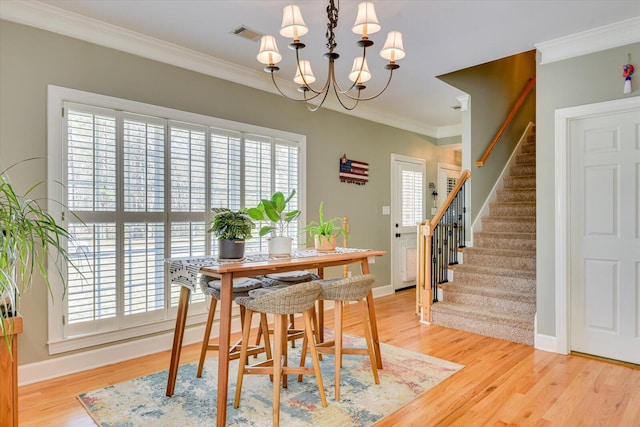 5407 Kiokee Ridge Rd, Evans, GA 30809 - dining space featuring stairway, ornamental molding, and wood finished floors