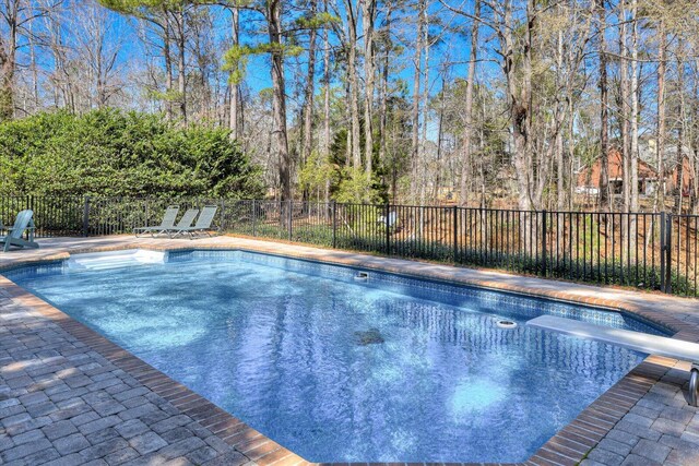 5407 Kiokee Ridge Rd, Evans, GA 30809 - view of pool with a fenced in pool, fence, a patio, and a diving board
