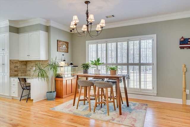 5407 Kiokee Ridge Rd, Evans, GA 30809 - dining space with a chandelier, a healthy amount of sunlight, and light wood finished floors