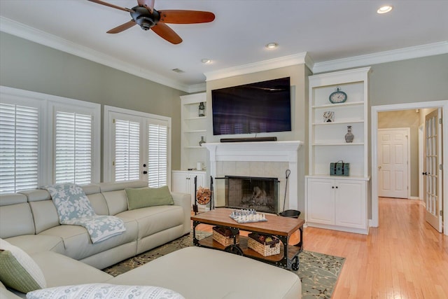 5407 Kiokee Ridge Rd, Evans, GA 30809 - living area featuring crown molding, a fireplace, light wood-style flooring, a ceiling fan, and recessed lighting