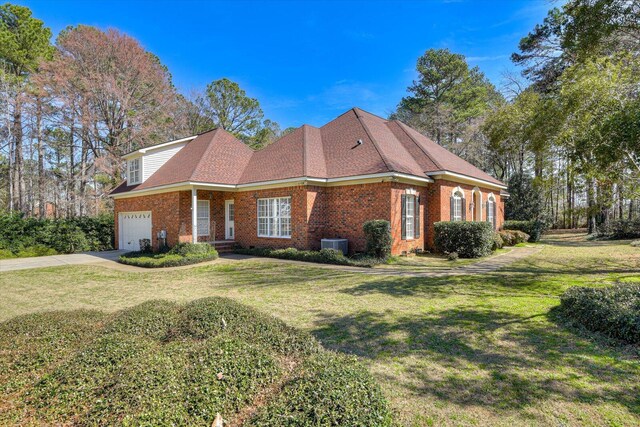 5407 Kiokee Ridge Rd, Evans, GA 30809 - view of front of home featuring a garage, a front yard, driveway, and brick siding