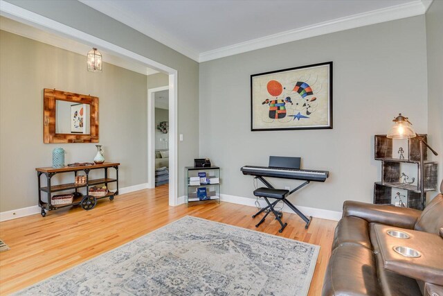 5407 Kiokee Ridge Rd, Evans, GA 30809 - living room featuring baseboards, ornamental molding, and wood finished floors