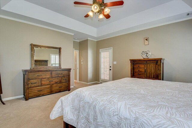5407 Kiokee Ridge Rd, Evans, GA 30809 - bedroom with crown molding, light carpet, baseboards, ceiling fan, and a raised ceiling