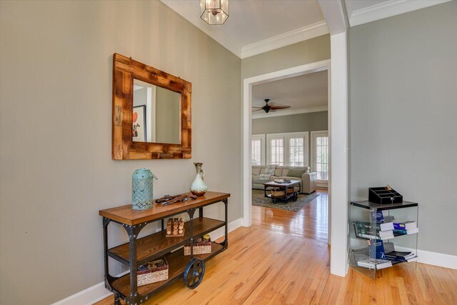 5407 Kiokee Ridge Rd, Evans, GA 30809 - corridor featuring baseboards, ornamental molding, and wood finished floors