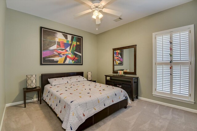 5407 Kiokee Ridge Rd, Evans, GA 30809 - carpeted bedroom featuring visible vents, a ceiling fan, and baseboards