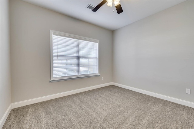 carpeted empty room with ceiling fan