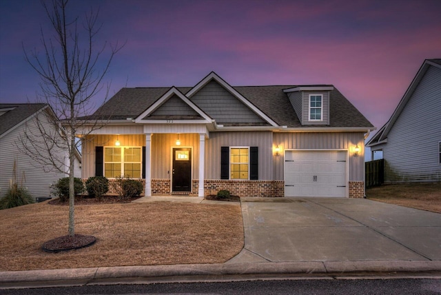 craftsman-style home featuring a garage and a porch